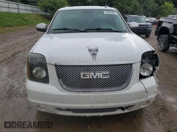 2011 GMC Yukon SLT z VIN 1GKS2CE00BR150352, wystawiony jako Copart lot #61031085 z przebiegiem 258 142 mil mil oraz Czysty tytuł • Clean title. Historia ofert i sprzedaży dostępna na DreamBid. Obrazek 5.