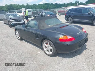 2002 Porsche Boxster S z VIN WP0CB29842U663272, wystawiony jako IAAI lot #42604562 z przebiegiem 68 927 mil mil oraz . Historia ofert i sprzedaży dostępna na DreamBid. Obrazek 3.