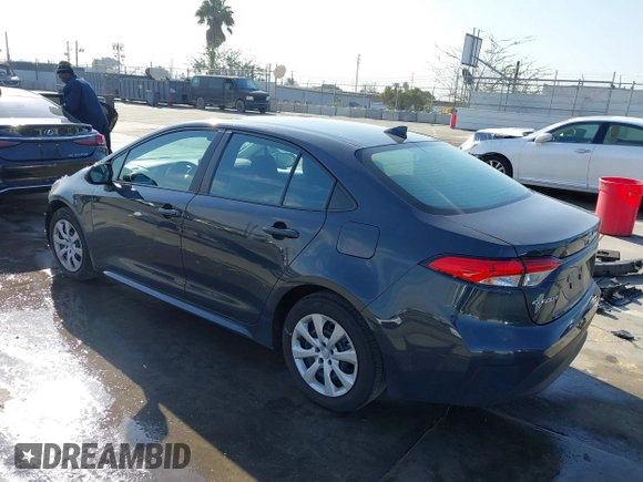 2023 Toyota Corolla LE with VIN 5YFB4MDE5PP014910, listed as a IAAI auction lot 41860905 with 40,517 mi miles. Bid and sale history available at carsss.com. Image 3.