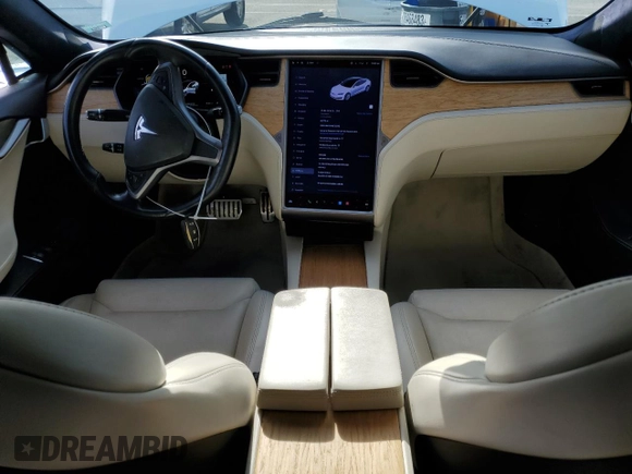 2019 Tesla Model S 100D with VIN 5YJSA1E44KF335113, listed as a Copart auction lot 82936844 with 89,770 mi miles and Salvage title. Bid and sale history available at DreamBid. Image 8.