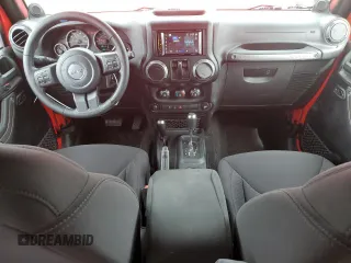2014 Jeep Wrangler Sport with VIN 1C4AJWAG1EL143206, listed as a Copart auction lot 51167695 with 100,734 mi miles and Salvage Title. Bid and sale history available at carsss.com. Image 8.