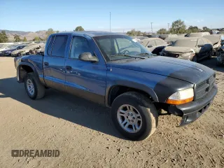 2004 Dodge Dakota Sport with VIN 1D7HL38NX4S789687, listed as a Copart auction lot 77435824 with 157,993 mi miles and Salvage Title. Bid and sale history available at carsss.com. Image 4.