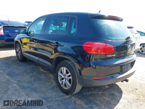 2012 Volkswagen Tiguan LE with VIN WVGAV7AX1CW557250, listed as a IAAI auction lot 42300694 with 122,310 mi miles and . Bid and sale history available at DreamBid. Image 3.