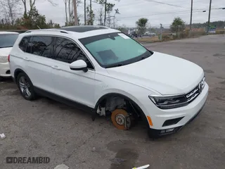 2019 Volkswagen Tiguan SEL Premium with VIN 3VV4B7AXXKM004316, listed as a IAAI auction lot 41458459 with 36,709 mi miles. Bid and sale history available at carsss.com. Image 1.