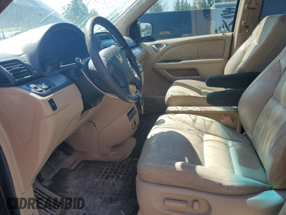 2005 Honda Odyssey EX-L z VIN 5FNRL38735B043791, wystawiony jako Copart lot #55844725 z przebiegiem 172 648 mil mil oraz Szkoda całkowita • Salvage title. Historia ofert i sprzedaży dostępna na DreamBid. Obrazek 7.