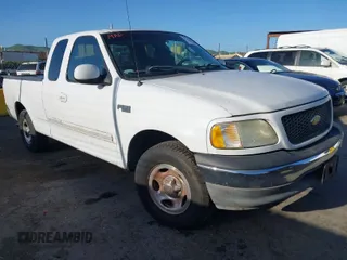 2002 Ford F-150 XL with VIN 1FTRX17292NB12320, listed as a IAAI auction lot 41904506 with 89,191 mi miles. Bid and sale history available at carsss.com. Image 1.