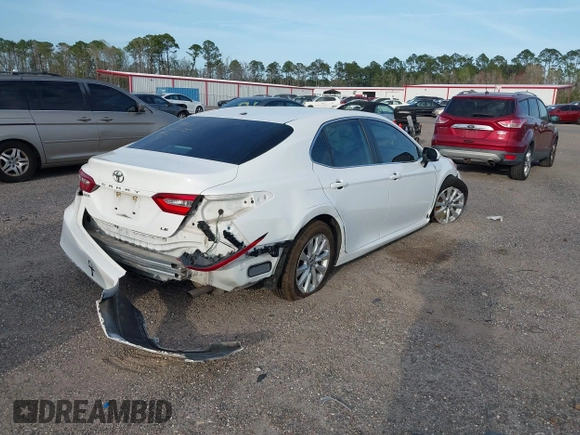 2019 Toyota Camry LE with VIN 4T1B11HK7KU806197, listed as a IAAI auction lot 41721148 with 83,373 mi miles and . Bid and sale history available at DreamBid. Image 4.