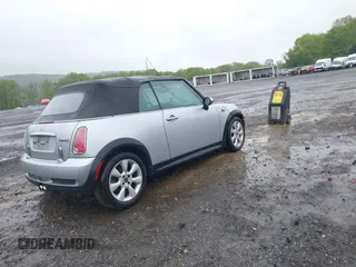 2006 MINI Convertible S with VIN WMWRH33586TF88407, listed as a IAAI auction lot 42223156 with 199,948 mi miles and . Bid and sale history available at DreamBid. Image 4.