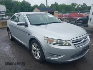 2011 Ford Taurus SEL z VIN 1FAHP2EW3BG103341, wystawiony jako IAAI lot #42547710 z przebiegiem 124 344 mil mil oraz . Historia ofert i sprzedaży dostępna na DreamBid. Obrazek 1.
