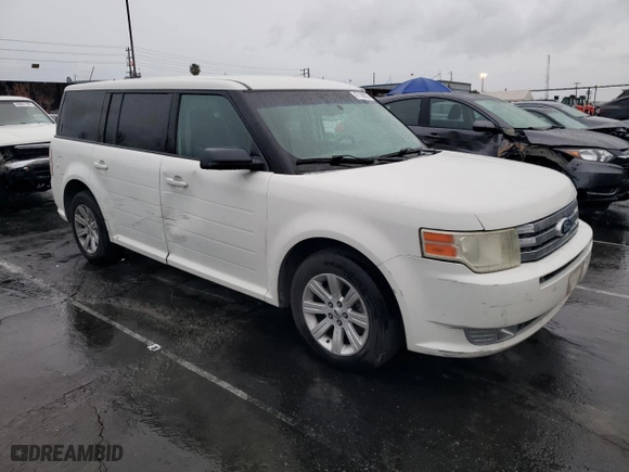 2011 Ford Flex SE with VIN 2FMGK5BC5BBD28380, listed as a Copart auction lot 47198935 with 214,128 mi miles and Salvage Title. Bid and sale history available at carsss.com. Image 4.