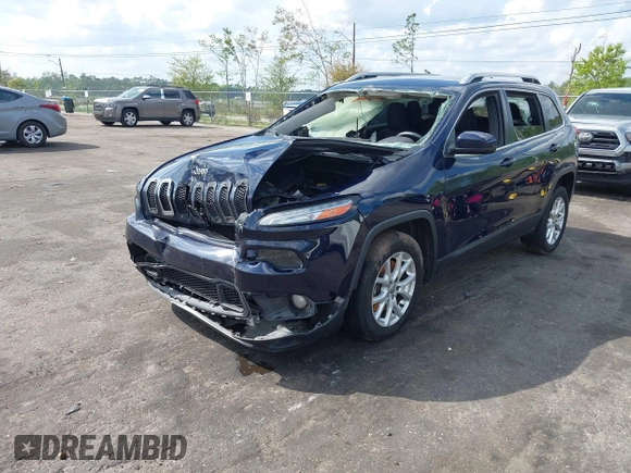 2015 Jeep Cherokee Latitude with VIN 1C4PJLCB5FW694359, listed as a IAAI auction lot 41934213 with 117,723 mi miles and . Bid and sale history available at DreamBid. Image 17.