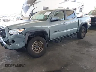 2022 Toyota Tacoma SR with VIN 3TMCZ5ANXNM479025, listed as a IAAI auction lot 42280363 with 29,650 mi miles and . Bid and sale history available at DreamBid. Image 17.