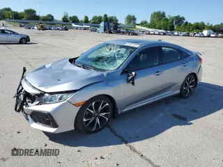 2018 Honda Civic Si z VIN 2HGFC1E53JH706440, wystawiony jako Copart lot #59107105 z przebiegiem 63 382 mil mil oraz Szkoda całkowita • Salvage title. Historia ofert i sprzedaży dostępna na DreamBid. Obrazek 1.