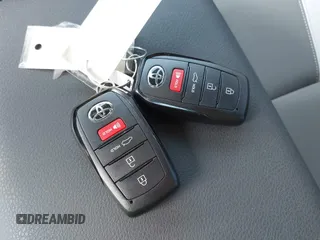 2025 Toyota Camry LE with VIN 4T1DAACK8SU087087, listed as a IAAI auction lot 41786593 with 4,901 mi miles and . Bid and sale history available at DreamBid. Image 11.