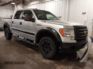 2012 Ford F-150 XL with VIN 1FTFW1EF1CFC11821, listed as a IAAI auction lot 41739728 with 118,544 mi miles. Bid and sale history available at carsss.com. Image 1.