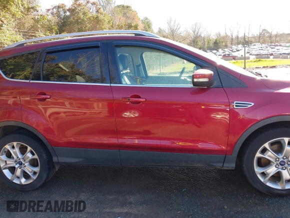 2016 Ford Escape Titanium with VIN 1FMCU0J93GUB01191, listed as a IAAI auction lot 41824183 with 97,241 mi miles. Bid and sale history available at carsss.com. Image 13.
