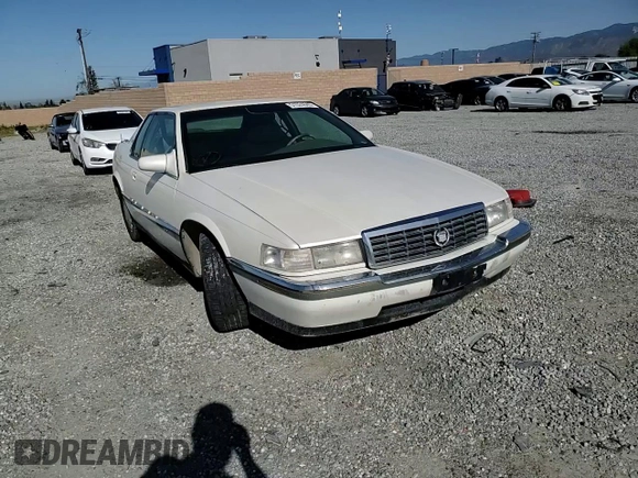 1994 Cadillac Eldorado ESC z VIN 1G6EL12Y6RU619510, wystawiony jako Copart lot #51524645 z przebiegiem 139 223 mil mil oraz Szkody całkowita. Historia ofert i sprzedaży dostępna na DreamBid. Obrazek 10.