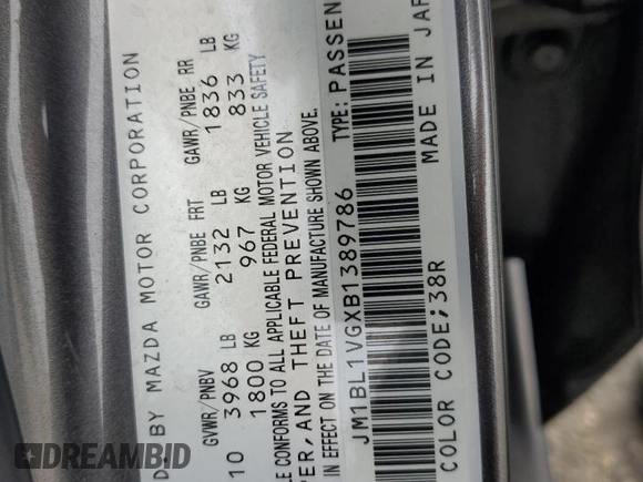 2011 Mazda 3 i Touring with VIN JM1BL1VGXB1389786, listed as a Copart auction lot 55629525 with 162,180 mi miles and Salvage Title. Bid and sale history available at DreamBid. Image 12.