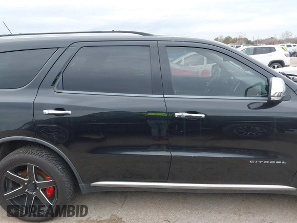 2011 Dodge Durango Citadel with VIN 1D4SE5GTXBC695700, listed as a IAAI auction lot 41381731 with 152,055 mi miles. Bid and sale history available at carsss.com. Image 13.
