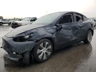 2024 Tesla Model Y Long Range z VIN 7SAYGDEE4RF060469, wystawiony jako Copart lot #54630105 z przebiegiem Nie podano mil oraz Szkoda całkowita • Salvage title. Historia ofert i sprzedaży dostępna na DreamBid. Obrazek 1.