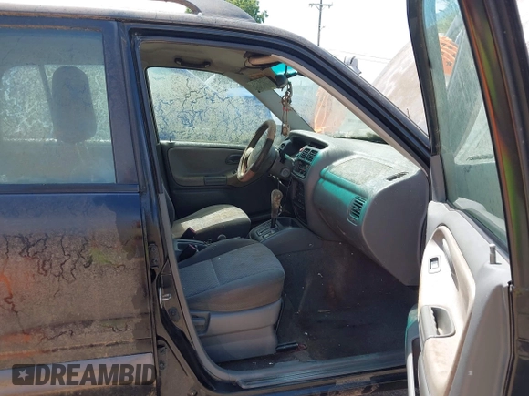 2003 Chevrolet Tracker with VIN 2CNBJ134X36921126, listed as a IAAI auction lot 42536787 with 199,063 mi miles and . Bid and sale history available at DreamBid. Image 5.
