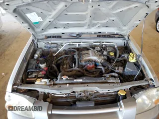2003 Nissan Frontier XE z VIN 1N6ED26Y43C421206, wystawiony jako Copart lot #42264105 z przebiegiem 117 879 mil mil oraz Szkoda całkowita • Salvage title. Historia ofert i sprzedaży dostępna na DreamBid. Obrazek 11.