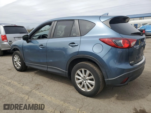 2016 Mazda CX-5 Touring with VIN JM3KE4CY9G0647226, listed as a Copart auction lot 51566405 with 77,785 mi miles and Salvage Title. Bid and sale history available at carsss.com. Image 2.
