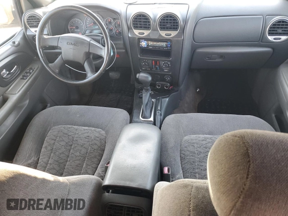 2004 GMC Envoy SLE with VIN 1GKDS13S542233286, listed as a Copart auction lot 76129164 with 228,981 mi miles and Salvage Title. Bid and sale history available at DreamBid. Image 8.