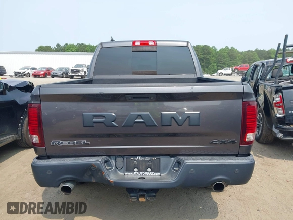 2017 Ram 1500 Rebel with VIN 1C6RR7YT6HS861839, listed as a IAAI auction lot 42407025 with 127,084 mi miles and . Bid and sale history available at DreamBid. Image 16.