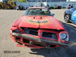 1975 Pontiac Firebird z VIN 2U87S5N582923, wystawiony jako Copart lot #72821784 z przebiegiem 37 718 mil mil oraz Tytuł czysty. Historia ofert i sprzedaży dostępna na DreamBid. Obrazek 5.