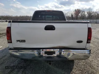 2000 Ford F-150 XL with VIN 1FTRX18L1YNB97492, listed as a Copart auction lot 48732055 with 315,898 mi miles and Salvage Title. Bid and sale history available at carsss.com. Image 6.