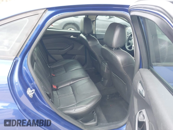 2014 Ford Focus SE with VIN 1FADP3F21EL314534, listed as a IAAI auction lot 42130032 with 103,866 mi miles. Bid and sale history available at carsss.com. Image 8.