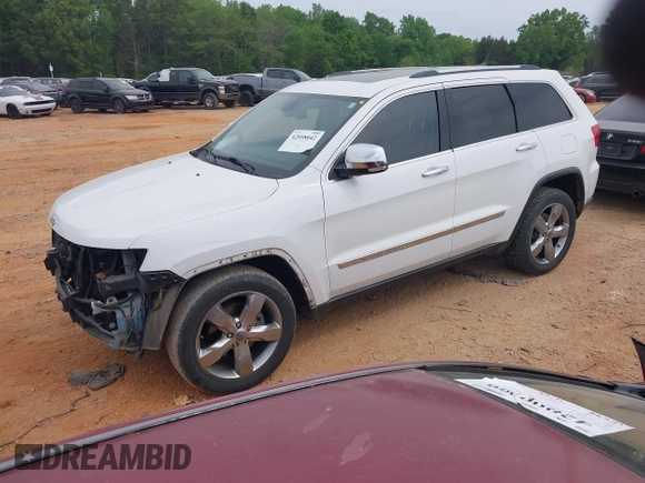 2013 Jeep Grand Cherokee Overland with VIN 1C4RJECGXDC621227, listed as a IAAI auction lot 42098042 with 194,232 mi miles and . Bid and sale history available at DreamBid. Image 2.