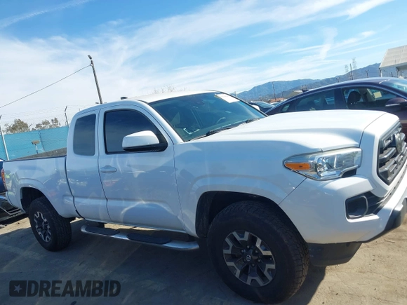 2018 Toyota Tacoma SR with VIN 5TFRX5GN9JX106232, listed as a IAAI auction lot 41634120 with 66,674 mi miles and . Bid and sale history available at DreamBid. Image 13.