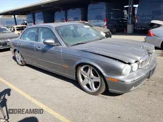 2005 Jaguar XJ with VIN SAJWA79C15SG40523, listed as a Copart auction lot 77994844 with 113,634 mi miles and Clean Title. Bid and sale history available at carsss.com. Image 4.