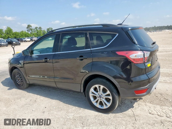 2017 Ford Escape SE z VIN 1FMCU0GD2HUC07371, wystawiony jako Copart lot #59223875 z przebiegiem 26 805 mil mil oraz Szkoda całkowita • Salvage title. Historia ofert i sprzedaży dostępna na DreamBid. Obrazek 2.