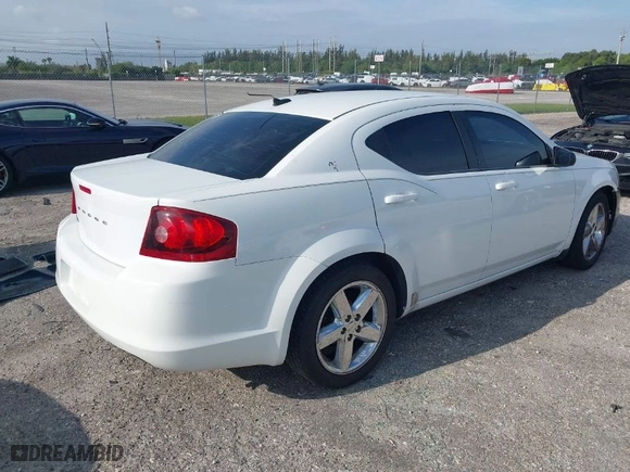 2012 Dodge Avenger SE with VIN 1C3CDZABXCN151302, listed as a IAAI auction lot 41986787 with 135,224 mi miles. Bid and sale history available at carsss.com. Image 4.