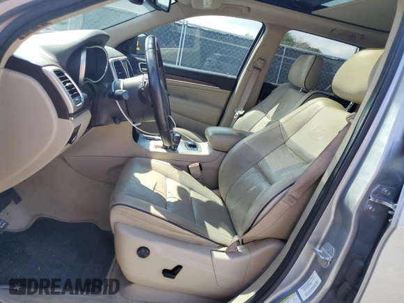 2014 Jeep Grand Cherokee Overland with VIN 1C4RJFCG1EC216154, listed as a Copart auction lot 50984675 with 91,782 mi miles and Salvage Title. Bid and sale history available at carsss.com. Image 7.