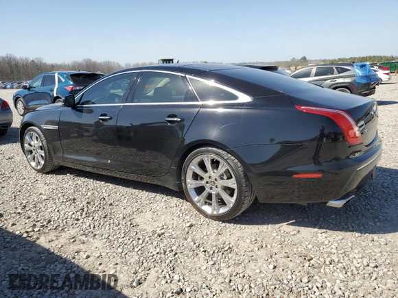 2012 Jaguar XJ with VIN SAJWA1CB5CLV29023, listed as a Copart auction lot 48300165 with 42,725 mi miles and Salvage title. Bid and sale history available at DreamBid. Image 2.