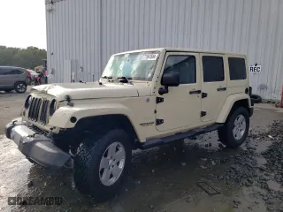 2011 Jeep Wrangler Unlimited Sahara with VIN 1J4BA5H19BL593658, listed as a Copart auction lot 71947684 with 122,323 mi miles and Salvage Title. Bid and sale history available at carsss.com. Image 1.