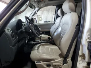 2004 Jeep Liberty Limited z VIN 1J4GL58K64W234858, wystawiony jako Copart lot #53699625 z przebiegiem 188 854 mil mil oraz Szkoda całkowita • Salvage title. Historia ofert i sprzedaży dostępna na DreamBid. Obrazek 7.