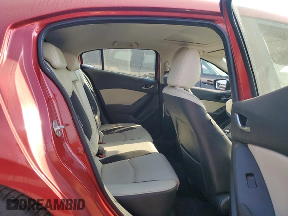 2016 Mazda 3 S Grand Touring z VIN JM1BM1N36G1342594, wystawiony jako Copart lot #57041185 z przebiegiem Nie podano mil oraz Szkoda całkowita • Salvage title. Historia ofert i sprzedaży dostępna na DreamBid. Obrazek 10.