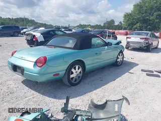 2003 Ford Thunderbird Deluxe z VIN 1FAHP60A33Y110451, wystawiony jako IAAI lot #42133863 z przebiegiem Nie podano mil oraz . Historia ofert i sprzedaży dostępna na DreamBid. Obrazek 4.