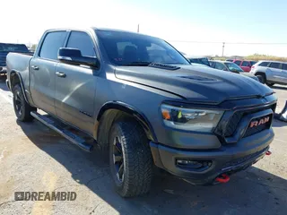 2019 Ram 1500 Rebel with VIN 1C6SRFLT7KN569786, listed as a IAAI auction lot 42100283 with 126,671 mi miles and . Bid and sale history available at DreamBid. Image 1.