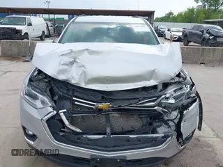 2020 Chevrolet Traverse LT with VIN 1GNERHKW3LJ237616, listed as a IAAI auction lot 42272845 with 87,104 mi miles and . Bid and sale history available at DreamBid. Image 6.