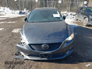 2014 Mazda 6 i Grand Touring with VIN JM1GJ1W67E1137886, listed as a IAAI auction lot 41405112 with 159,879 mi miles and . Bid and sale history available at DreamBid. Image 12.