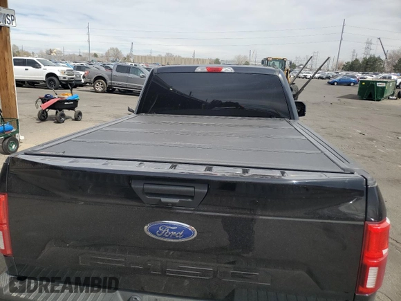 2020 Ford F-150 XL z VIN 1FTMF1E52LKD98234, wystawiony jako Copart lot #50552365 z przebiegiem 51 948 mil mil oraz Szkoda całkowita • Salvage title. Historia ofert i sprzedaży dostępna na DreamBid. Obrazek 10.