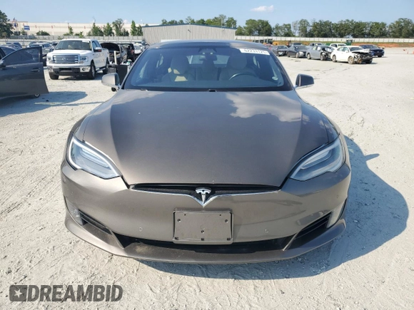 2017 Tesla Model S 100D z VIN 5YJSA1E2XHF173740, wystawiony jako Copart lot #62233125 z przebiegiem 73 932 mil mil oraz Szkoda całkowita • Salvage title. Historia ofert i sprzedaży dostępna na DreamBid. Obrazek 5.