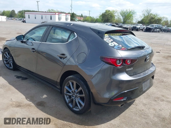 2023 Mazda 3 S Select with VIN JM1BPAKM3P1615785, listed as a IAAI auction lot 42064302 with 63,928 mi miles and . Bid and sale history available at DreamBid. Image 3.