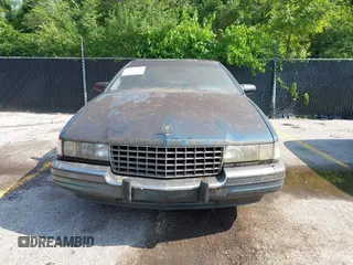 1992 Cadillac Seville z VIN 1G6KS53B4NU818363, wystawiony jako IAAI lot #42357836 z przebiegiem 91 439 mil mil oraz . Historia ofert i sprzedaży dostępna na DreamBid. Obrazek 6.